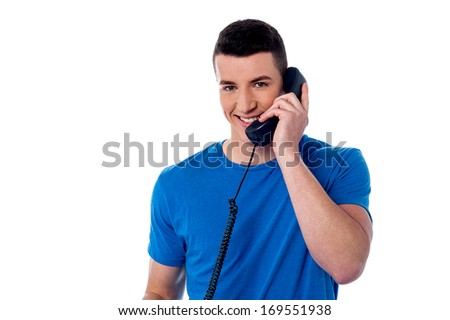 Young man answering the phone call