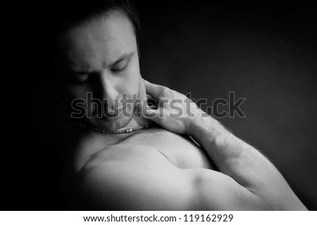 Portet muscular man with a beautiful body. black-and-white photo