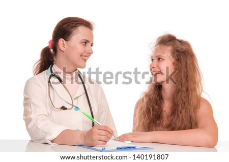 smiling doctor talking with child and takes notes. isolated on white background