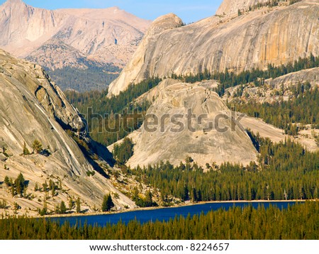 Sheer cliffs of the High Sierras above Tenaya Lake in Yosemite National Park
