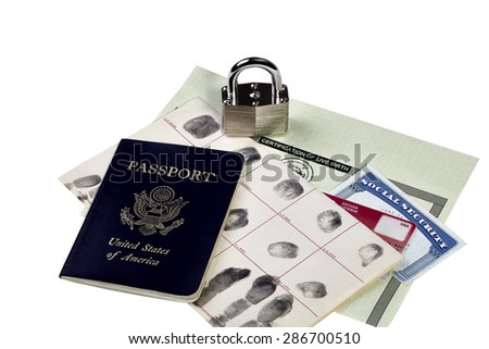 Passport, fingerprint card, driver\'s license, social security card and birth certificate isolated on white with locked padlock