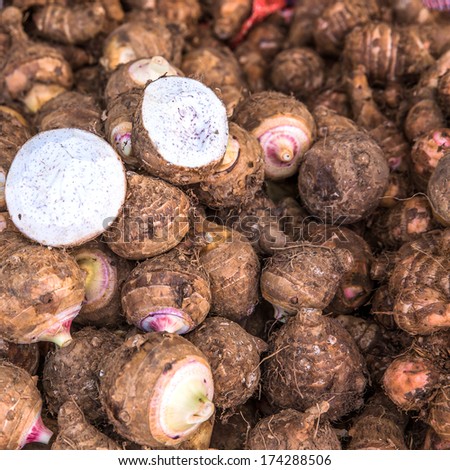 background of fresh taro root, Taro Roots at the market