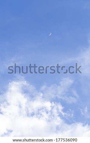 beautiful blue sky with withe clouds and crescent crescent moon on day, a beautiful moon on Morning with blue sky