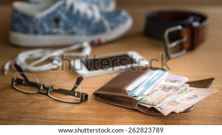 Still life concept of traveling all over the world with wallet