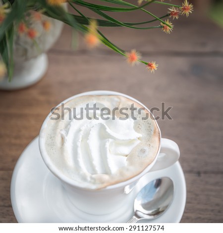 Coffee with cream, latte with whipped cream