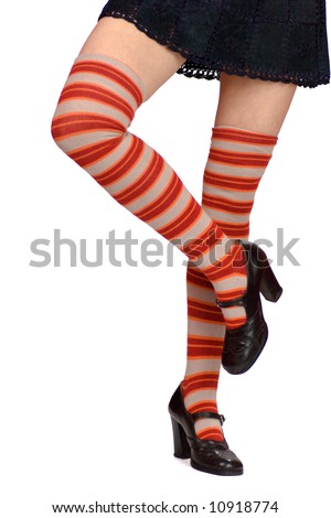 Young Woman'S Legs Wearing Striped White Orange Knee-Length Socks And ...