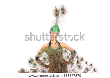 Burlesque dancer with peacock feathers and green dress