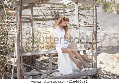 Beautiful Decorated Romantic house with woman in white wedding dress nature