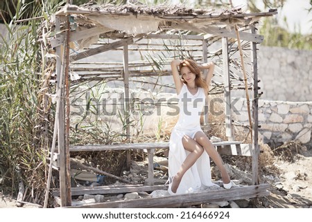 Beautiful Decorated Romantic house with woman in white wedding dress nature