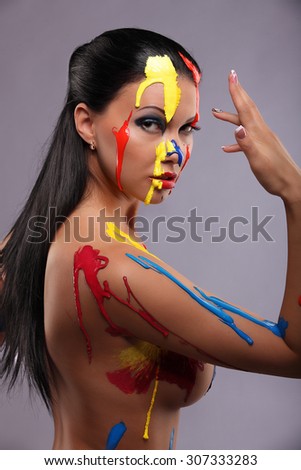 Portrait of a woman painted conceptual body art studio
