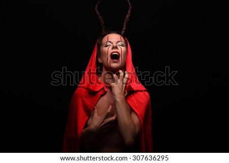 Portrait of a devil with horns. Fantasy halloween. Art project. studio