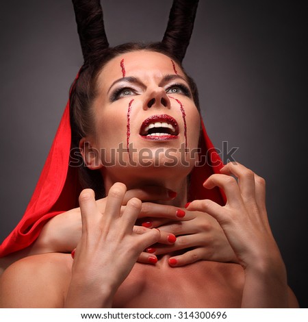 Portrait of a devil with horns. Fantasy halloween. Art project. studio