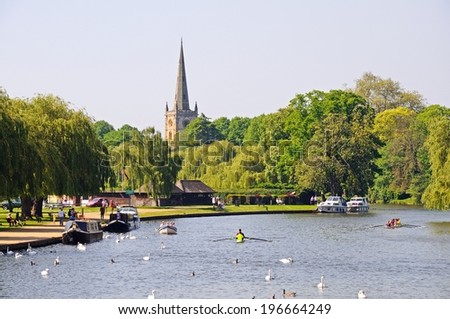 STRATFORD-UPON-AVON, UK - MAY 18, 2014 - View along the River Avon towards the Holy Trinity church, Stratford-Upon-Avon, Warwickshire, England, UK, Western Europe, May 18, 2014.