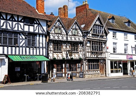 STRATFORD-UPON-AVON, UK - MAY 18, 2014 - Tudor buildings along the High Street including the Garrick Hotel, Stratford-Upon-Avon, Warwickshire, England, United Kingdom, Western Europe, May 18, 2014.