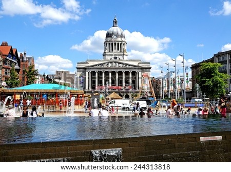 NOTTINGHAM, UK - JULY 17, 2014 - Council House also known as the city hall in the Old Market Square with a pool and fountain in the foreground, Nottingham, Nottinghamshire, England, UK, July 17, 2014.
