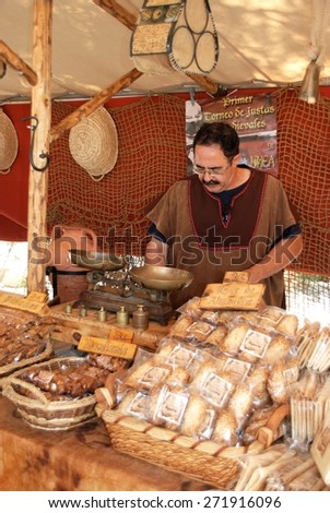 BARBATE, SPAIN - SEPTEMBER 14, 2008 - Bread and snack stall at the Medieval market, Barbate, Cadiz Province, Andalusia, Spain, Western Europe, September 14, 2008.
