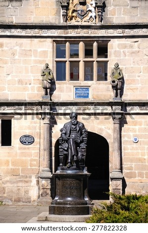 SHREWSBURY, UNITED KINGDOM - APRIL 22, 2015 - Statue of Charles Darwin outside Castle Gate Library, Shrewsbury, Shropshire, England, UK, Western Europe, April 22, 2015.