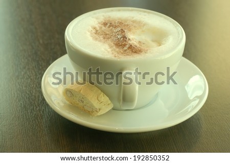 coffee cup capuccino hot drink sweet cake white plate table restaurant food background