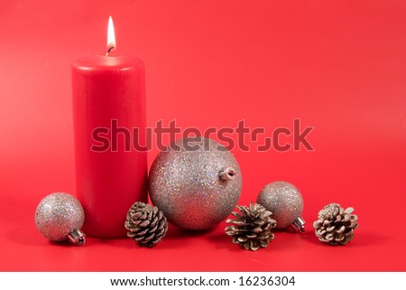 Christmas decoration on a red background (place for the text)