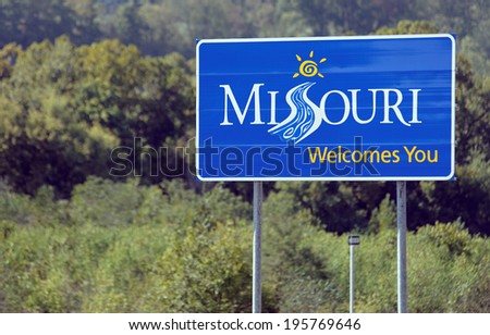 PINEVILLE, MO - OCTOBER 4: A welcome sign at the Missouri state line located in Pineville, Missouri on October 4, 2012. Missouri is a Midwestern U.S. state and the 24th state admitted to the union.