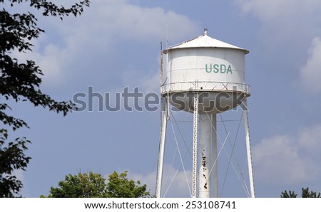 EAST LANSING, MI - AUGUST 1: A USDA water tower located in East Lansing, Michigan on August 1, 2014. The USDA executes US federal government policy on farming, agriculture, forestry, and food.