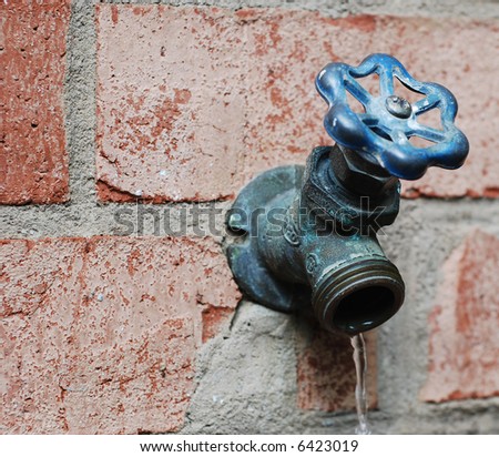 A water faucet of a suburban home