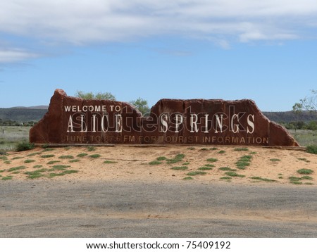 A sign welcoming travelers to Alice Springs, a town in NT, Australia.