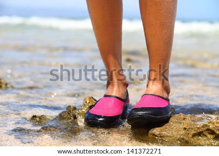 Similar – Image, Stock Photo Woman on stony seashore looking on foamy water washing peaks