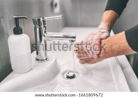 Washing hands rubbing with soap man for corona virus prevention, hygiene to stop spreading coronavirus. 商業照片 © 