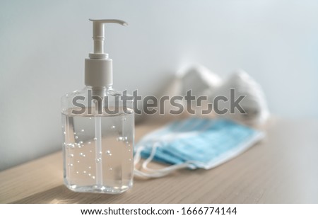 Similar – Image, Stock Photo alcohol gel or antibacterial disinfectant, stethoscope and protective mask. Hygiene and coronavirus concept. Covid-19