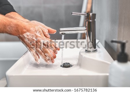 Similar – Image, Stock Photo doctor man washing hands with disinfectant soap. Hygiene and Corona virus Covid-19 concept