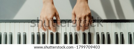 Image, Stock Photo Crop woman playing piano at home