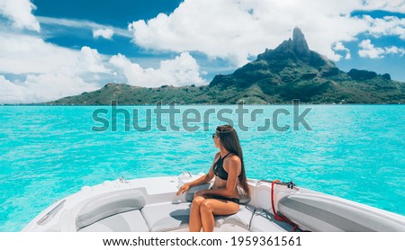 Similar – Image, Stock Photo Traveling woman on boat in sea