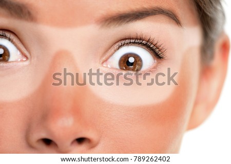 Sunburn tan lines of sunglasses, red painful skin. Scared Asian woman shocked with funny expression forgot to put sunscreen on face on summer vacation. Suntan skin cancer facial care concept. Stok fotoğraf © 