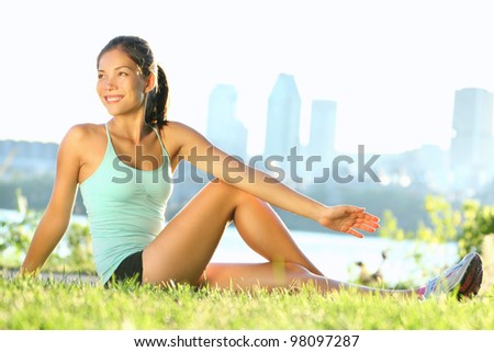 Similar – Woman stretching after running