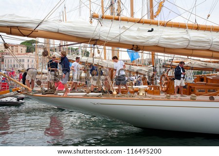 CANNES, FRANCE - SEPTEMBER 28, 2012: Unidentified crew members in the harbor after the 34th edition of the Regates Royales - Panerai Trophy 2012 on September 28 , 2012 in Cannes
