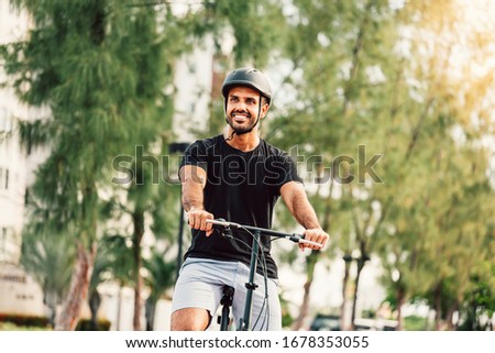 Similar – Image, Stock Photo Man with helmet riding custom motorbike
