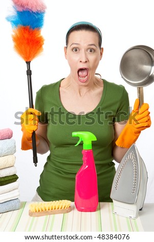 A Young Woman As A Stressed Out Angry Housewife On A White Background ...