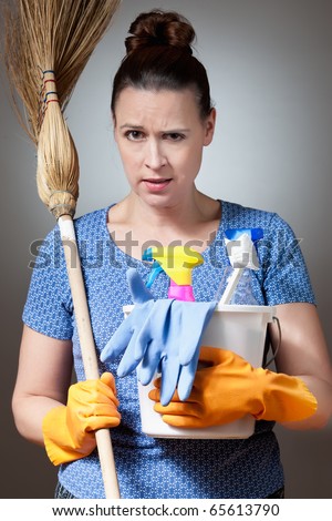 A young woman about to embark on a difficult cleaning job