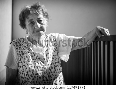 Old woman serenity look, black and white portrait