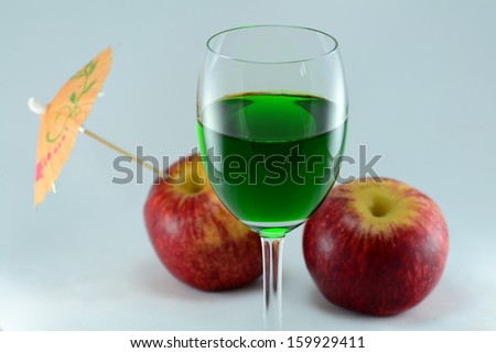 Apple and nectar with white background.