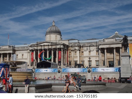 LONDON, ENGLAND, UK - SEPTEMBER 8: Tourists visiting Trafalgar Square on September 8, 2012 in London, England, UK