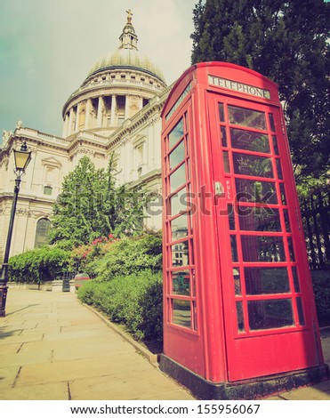 Vintage looking Traditional red telephone box in London UK