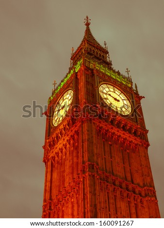 Vintage look Big Ben Houses of Parliament Westminster Palace London gothic architecture - at night