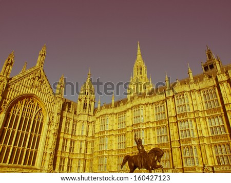 Vintage look Houses of Parliament Westminster Palace with Lord Cromwell monument, London