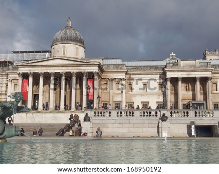 LONDON, ENGLAND, UK - OCTOBER 23: Tourist visiting the world famous Trafalgar Square on October 23, 2013 in London, England, UK