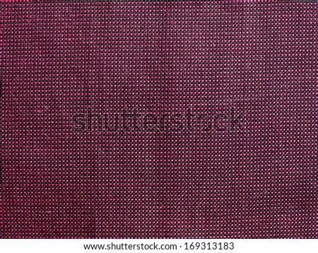 Maroon textile fabric texture useful as a background