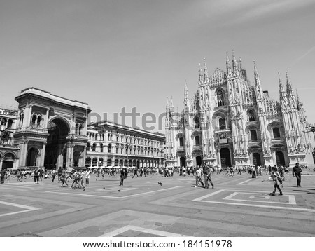 MILAN, ITALY - MAY 16: Tourists visiting the famous Piazza Duomo square in Milan Italy on May 16, 2011 in Milan, Italy