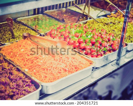 Vintage retro looking Take away food shop with vegetables, carrots and tomatoes