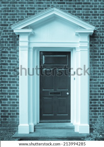 A traditional entrance door of a British house - cool cyanotype